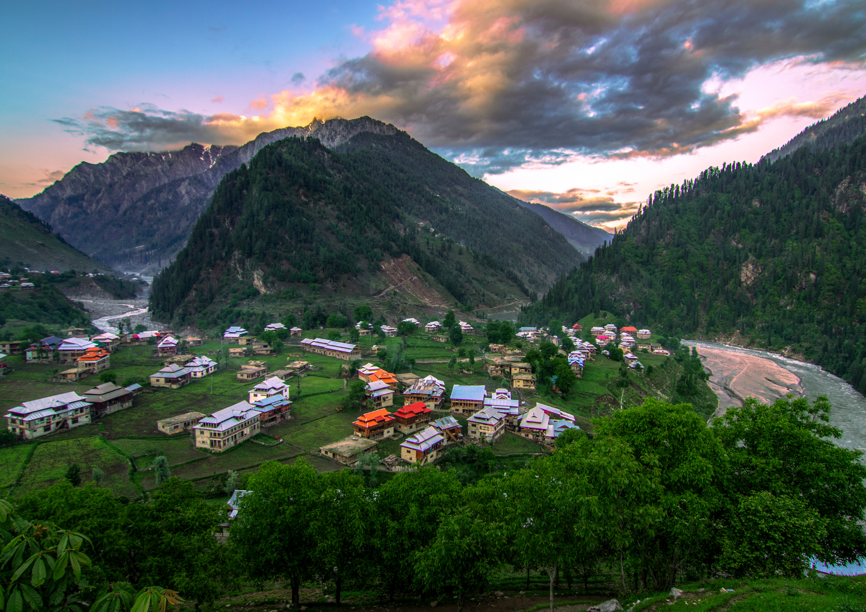 Sunset over a village in the mountains