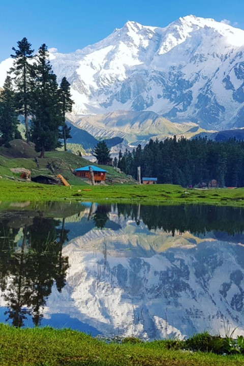 Majestic peaks of Hunza with lush greenery and beautiful landscape